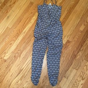 Printed V-Neck Strappy Pants Romper. Size X-Small